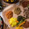 High angle shot of the ingredients of traditional Ethiopian food on loaves of bread